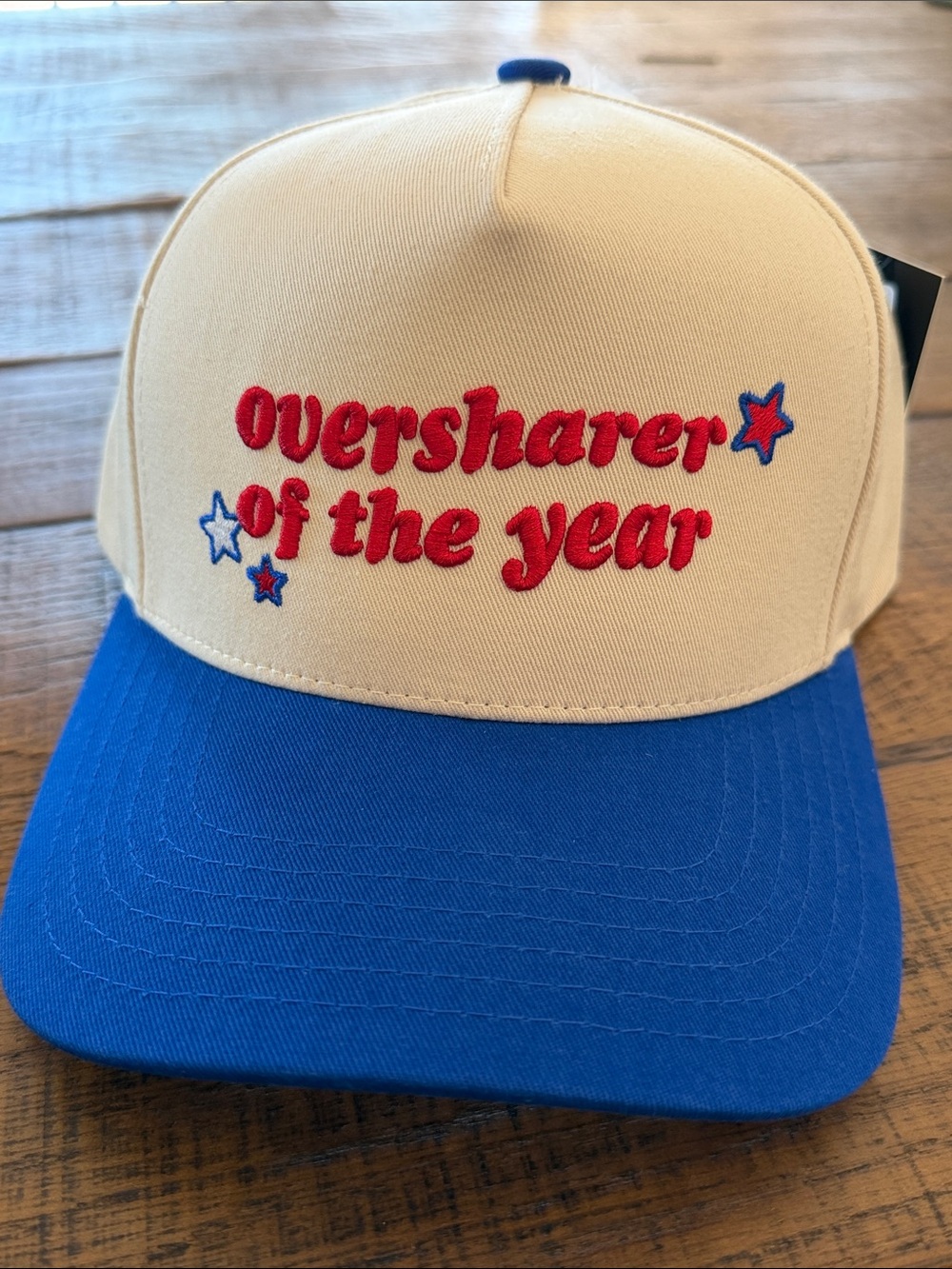 Unisex Embroidered New "Oversharer of the Year" Beige Red And Blue Snapback Hat